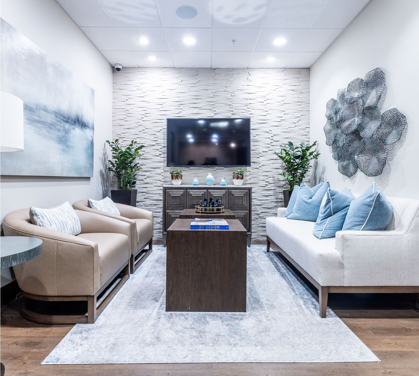 Modern lounge with comfortable seating and decor.